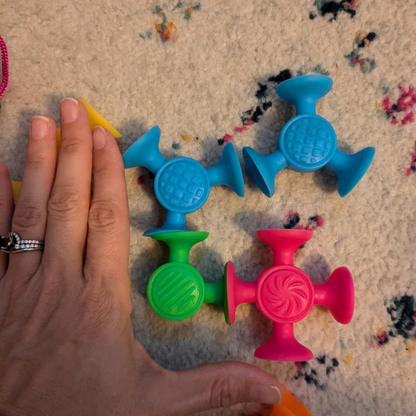 StickiTots - Pop. Stick. Play — Anywhere!
