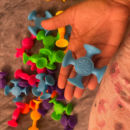 StickiTots - Pop. Stick. Play — Anywhere!